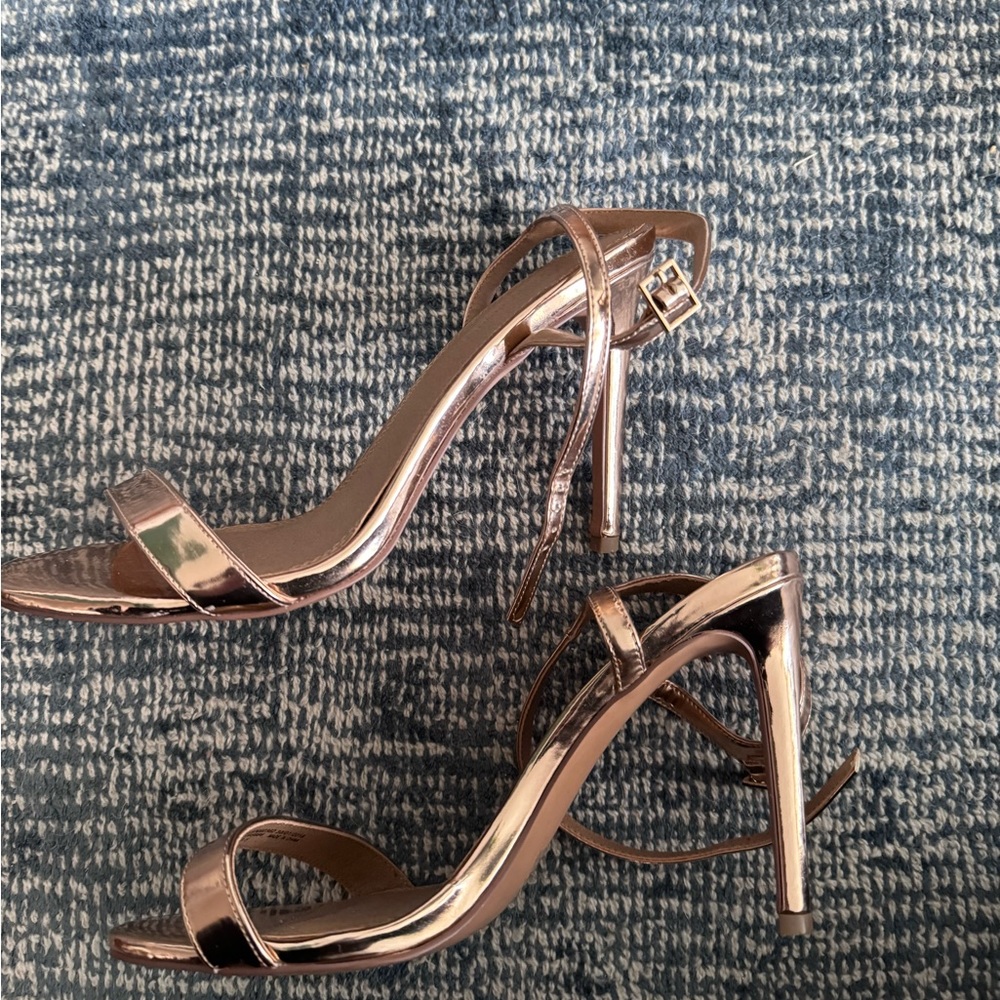 Lightly-worn rose gold heels